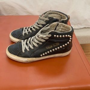 One of a kind Golden Goose sneakers.